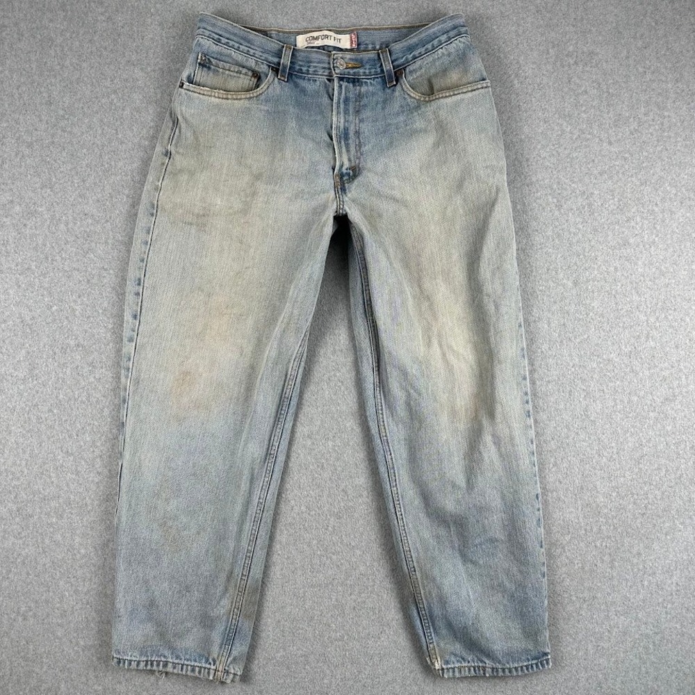Vintage Levi's 560 Comfort Fit Light Wash Denim Jeans Men's 34x30 Distressed Y2K